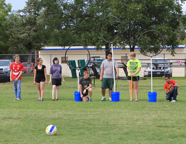 Members of the Quidditch team line up before the game begins. The team practices every Thursday from 3-4:45 p.m. They will be going head-to-head against the Martin Quidditch team in January. Students interested in playing can stop by sponsor Erica Bodes room, C210, or drop in on a practice.