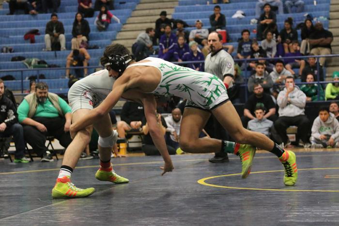 Senior Quentin Perez gets ready to take down his opponent. Perez was ranked as one of the top wrestlers in the state by the end of the season.