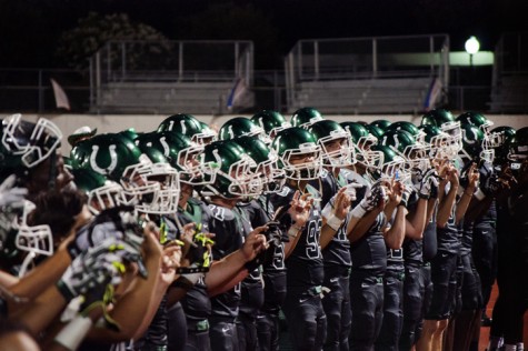 After their win, the players joined together to sing the alma mater.