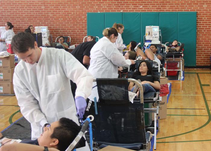 Students donate blood during the blood drive in October. StuCo and Carter BloodCare host two drives each year and collect enough blood to save hundreds of lives.