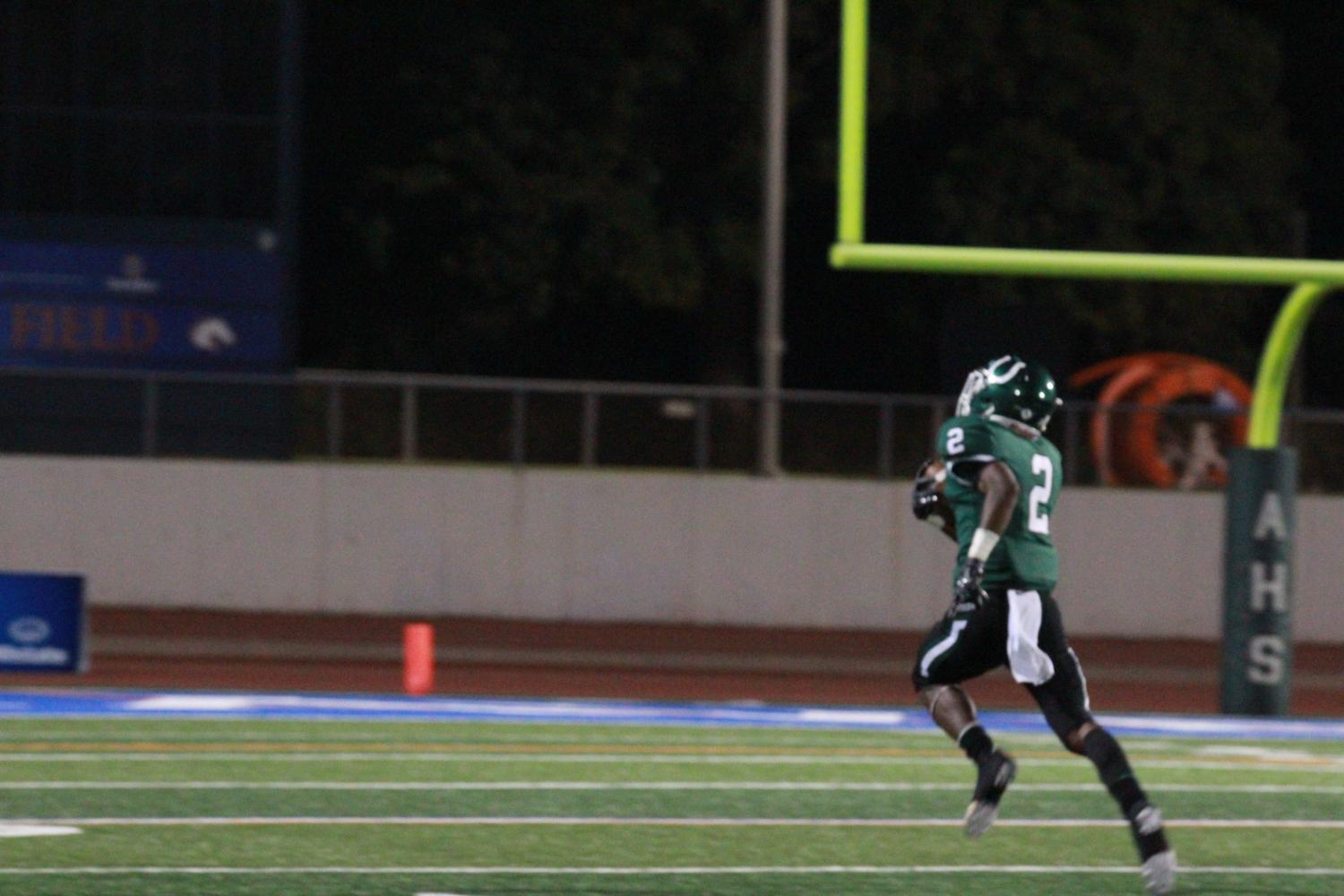 Senior Kenland McCray runs the ball in for a touchdown. The Colts came back from a 21-6 deficit in the 4th quarter to beat the South Grand Prairie Warriors in overtime.