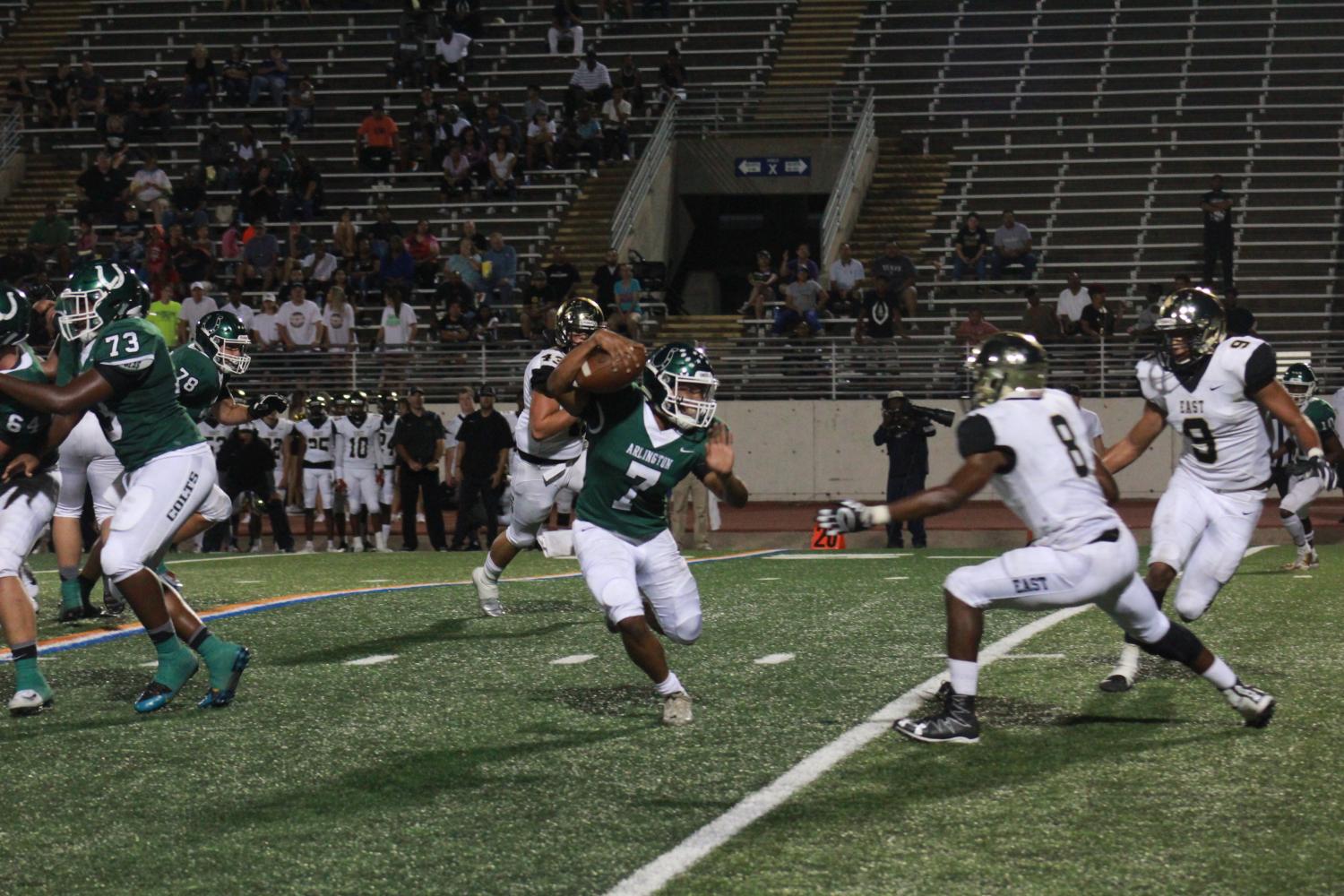 Senior QB D’Montae Davis scrambles as he tries to get around a Plano East Panther. Davis helped the Colts defeat the Panthers 56-21.