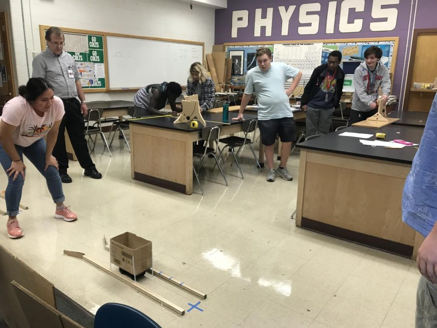 Students+in+Mike+Roarks+AP+Physics+C+class+participate+in+a+projectile+design+lab.+%E2%80%9CAbout+50%25+are+female+in+my+first+year+Physics+class%3B+however%2C+about+%E2%85%94+of+my+second+year+class+are+males%2C%E2%80%9D+Roark+said.+With+the+hashtag+She+can+STEM+trending+theres+a+national+push+to+get+more+females+in+STEM+careers.