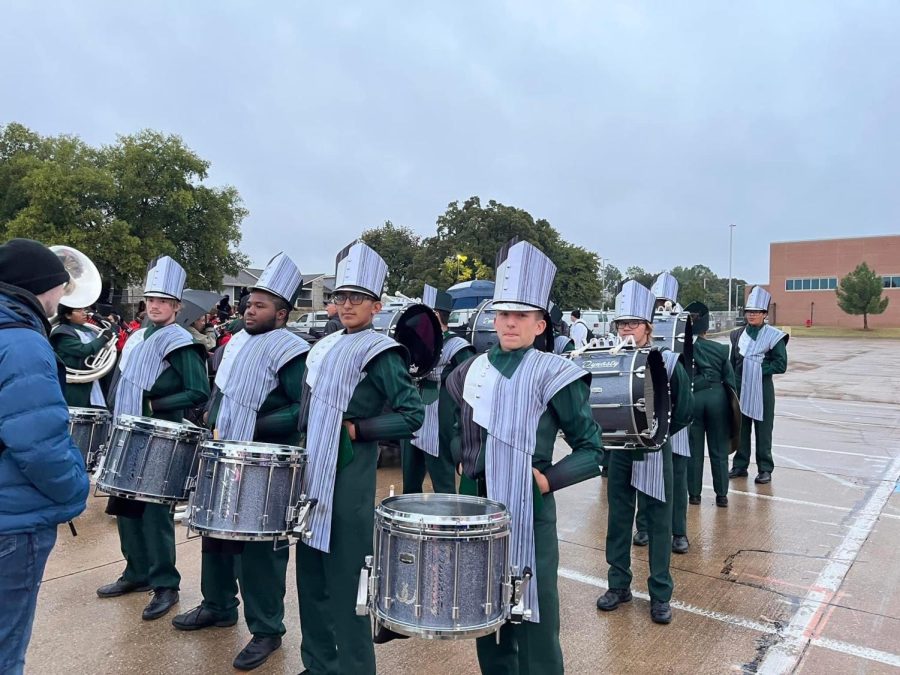 The marching band prepares to perform The Extra Step for Area. Though they did not advance, they had a successful season.