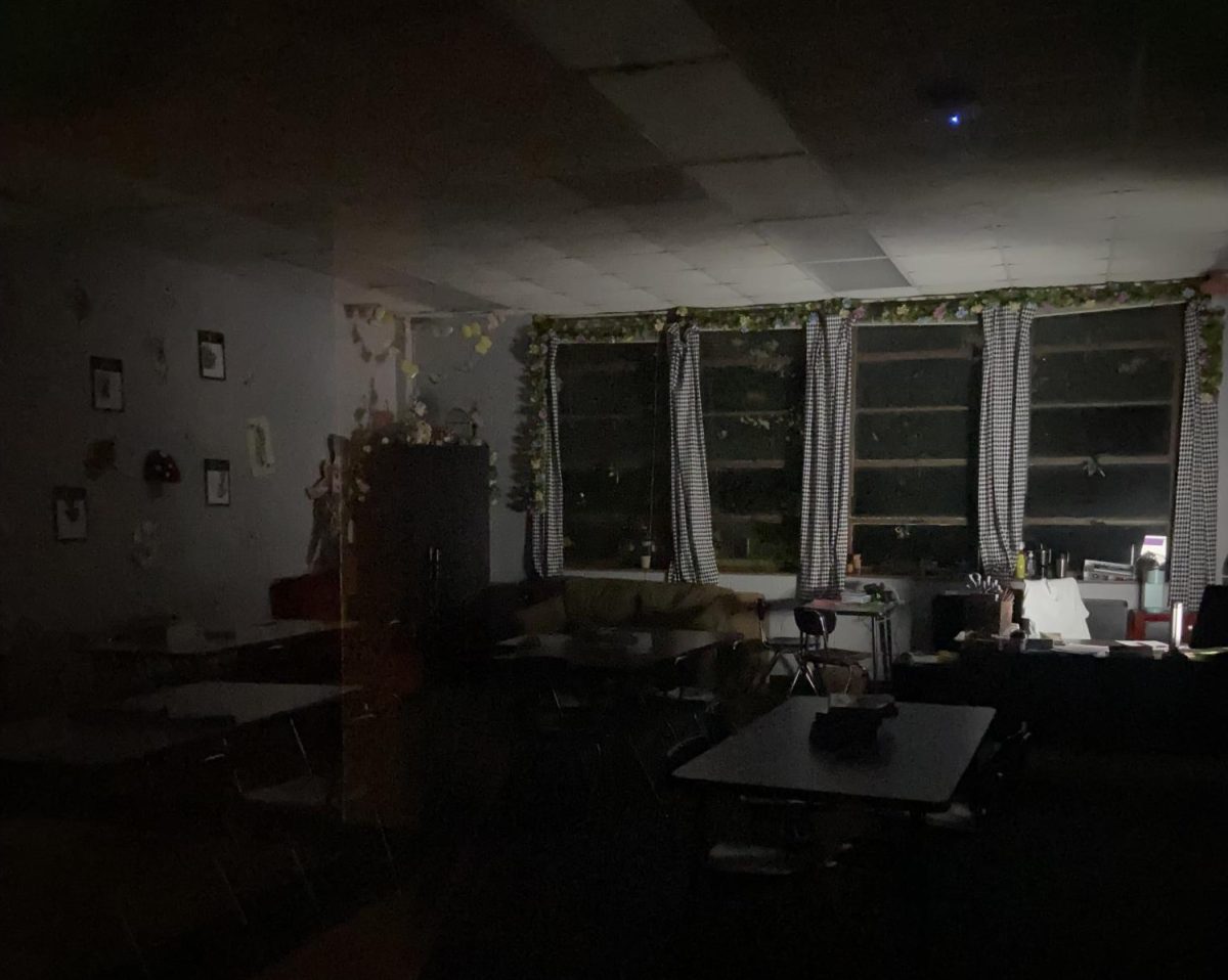 A classroom in C hall looks eerie in the glow of the projector. The Colt staff noticed the vines swaying, was it just the air conditioning or something more sinister?