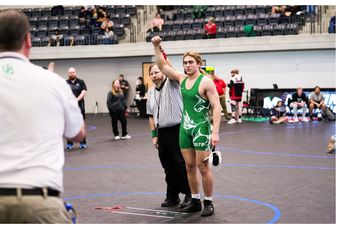 Senior+Owen+Nelson+collected+his+100th+career+win+at+the+UIL+District+tournament+in+January.+He+has+wrestled+for+the+school+since+his+freshman+year.